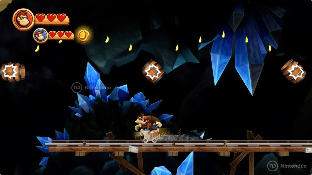 Donkey y Diddy Kong sobre una vagoneta en Donkey Kong Country Returns HD