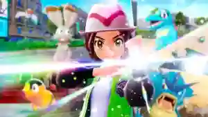 Entrenadora con sombrero rosa y chaqueta verde desatando energía brillante con su brazalete en Leyendas Pokémon ZA, rodeada de varios Pokémon en Ciudad Luminalia.