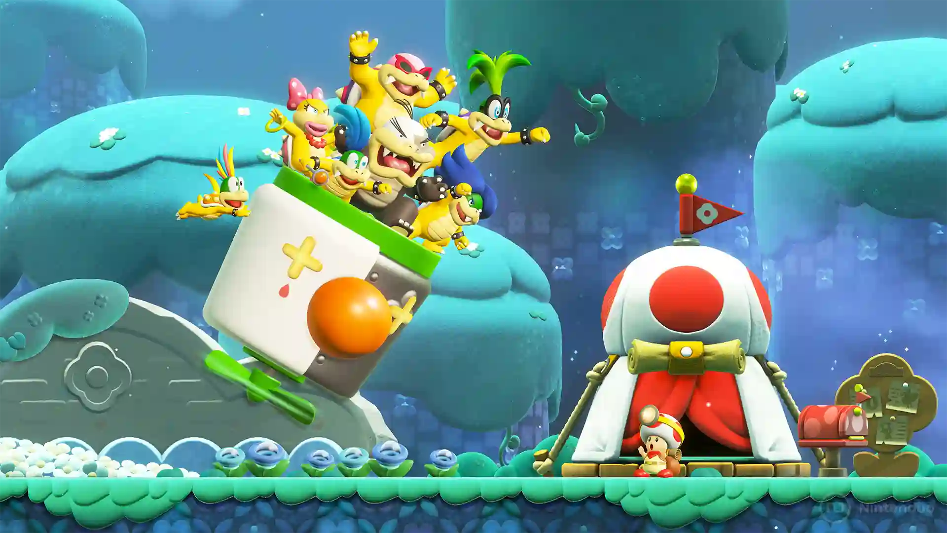 Super Mario Bros. Wonder – Nintendo Switch 2 Edition: grupo de Koopalings y Bowser Jr. celebrando sobre un vehículo blanco con signos de más y banderas rojas en un paisaje azul con nubes redondeadas.