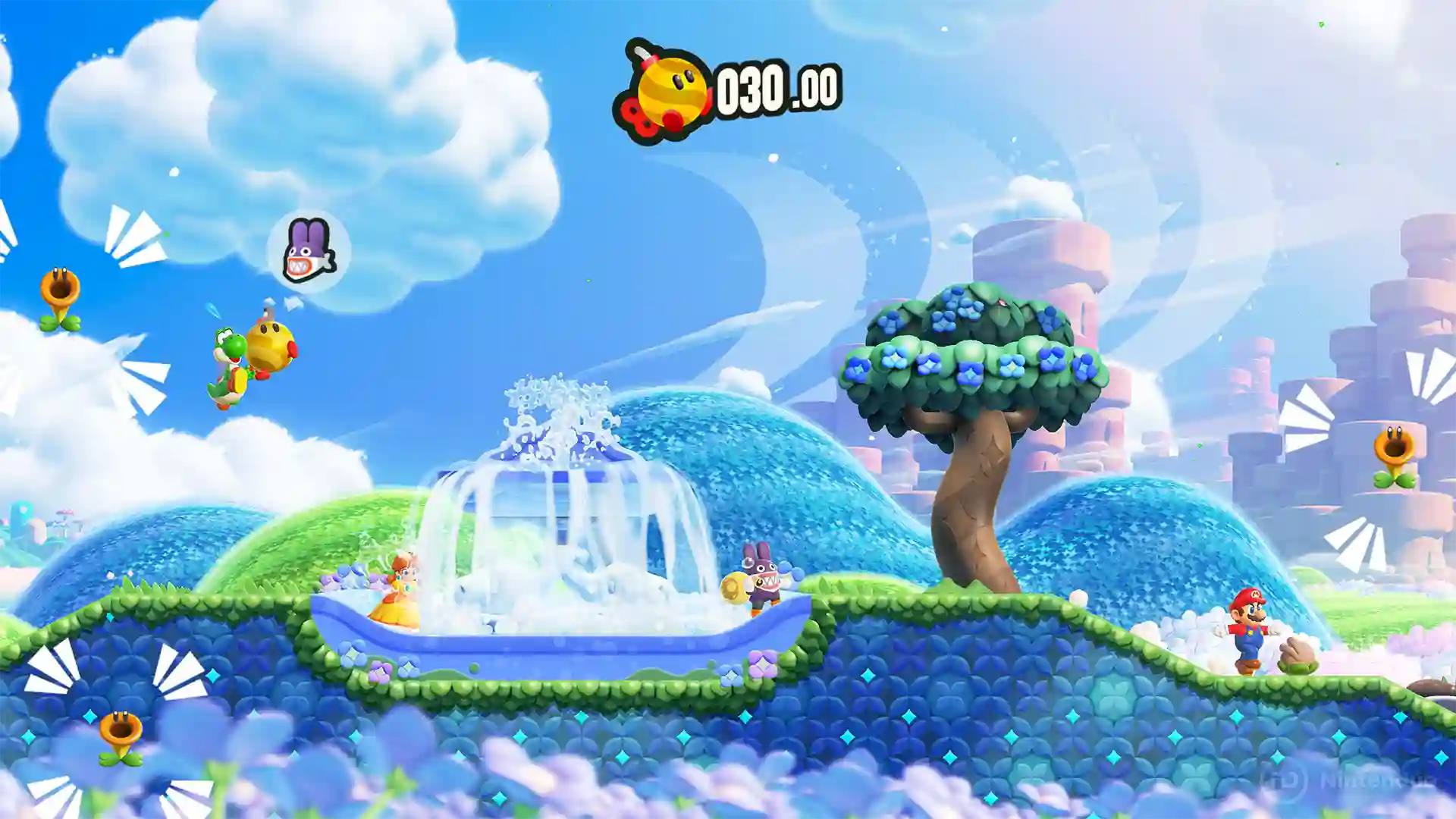 Super Mario Bros. Wonder – Nintendo Switch 2 Edition: Yoshi verde planea en el cielo portando una criatura morada y evitando a un wiggler amarillo con cronómetro, con grandes nubes y una isla flotante de fondo.