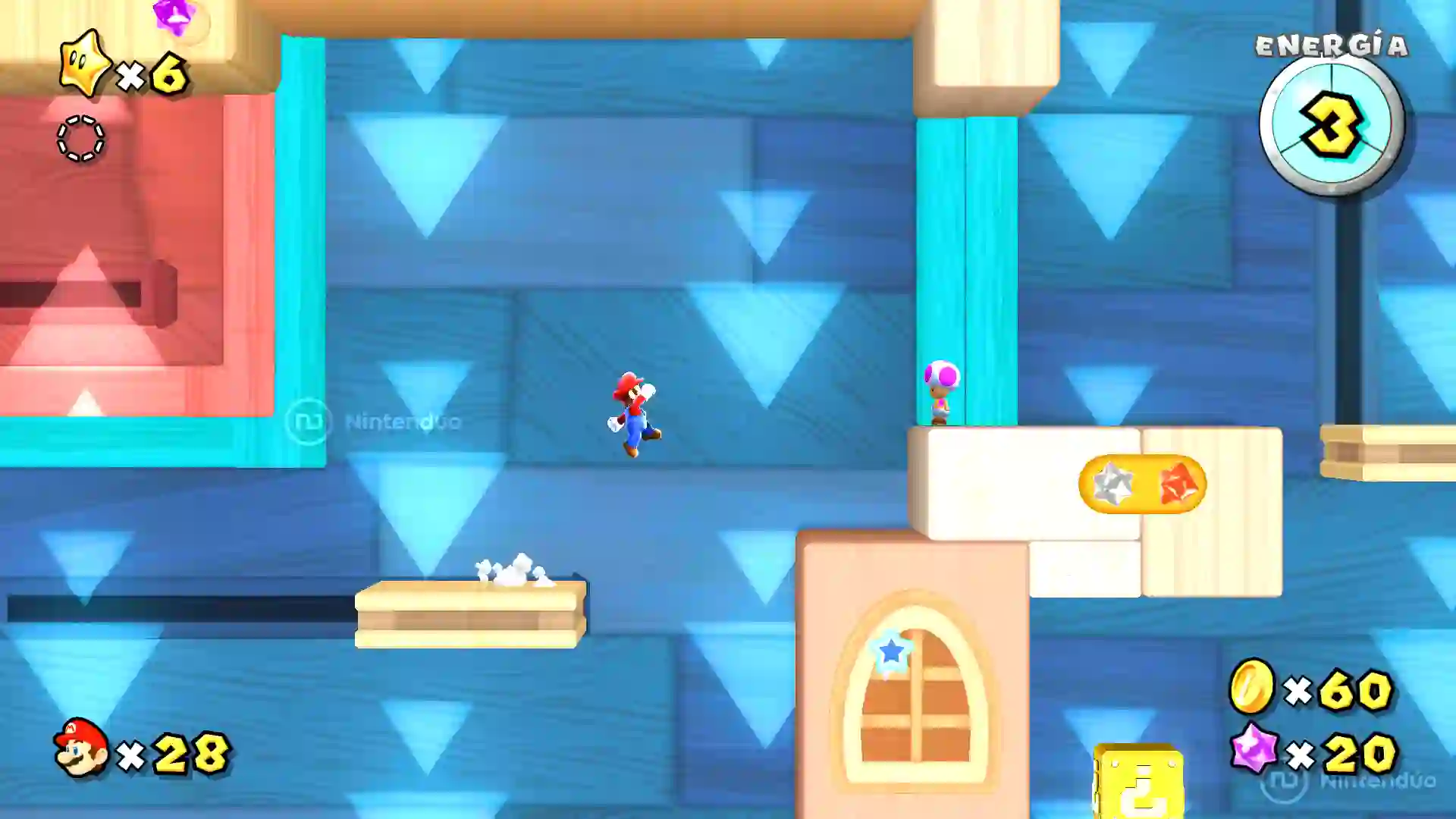 Mario en Super Mario Galaxy recorriendo una sección de desplazamiento lateral con plataformas azules y contadores de vidas y energía en pantalla.