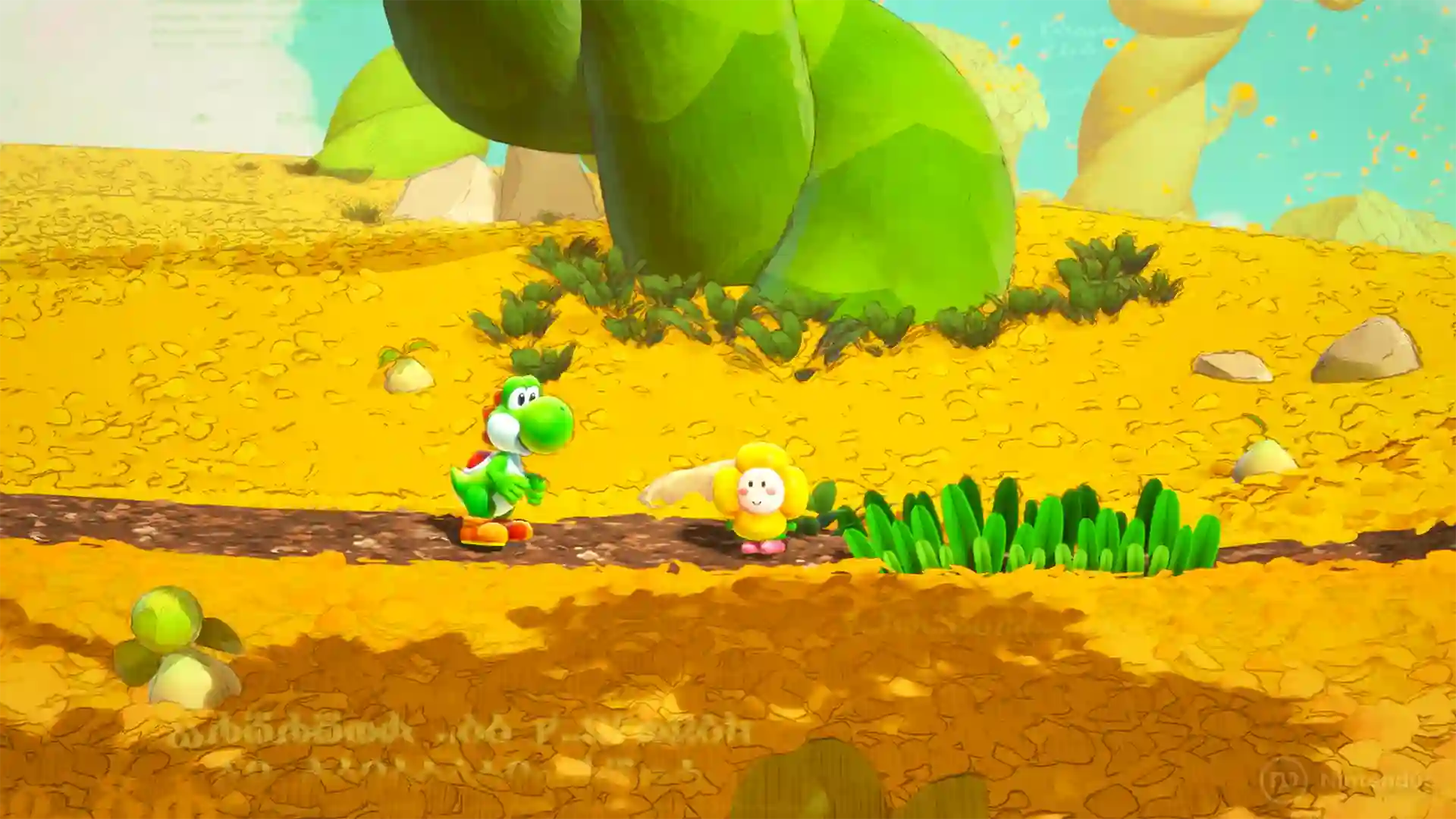 Yoshi and the Mysterious Book: Yoshi verde camina por un paisaje desertico amarillo junto a una enorme planta de cactus y montanas al fondo