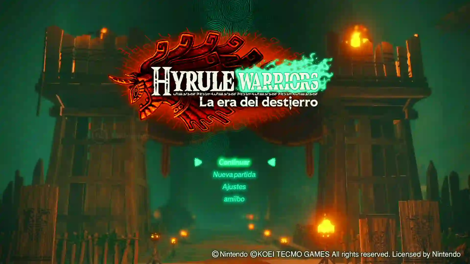 Pantalla de título de Hyrule Warriors: La era del destierro con el logo del juego y opciones Continuar, Nueva partida, Ajustes y amiibo frente a un castillo iluminado.