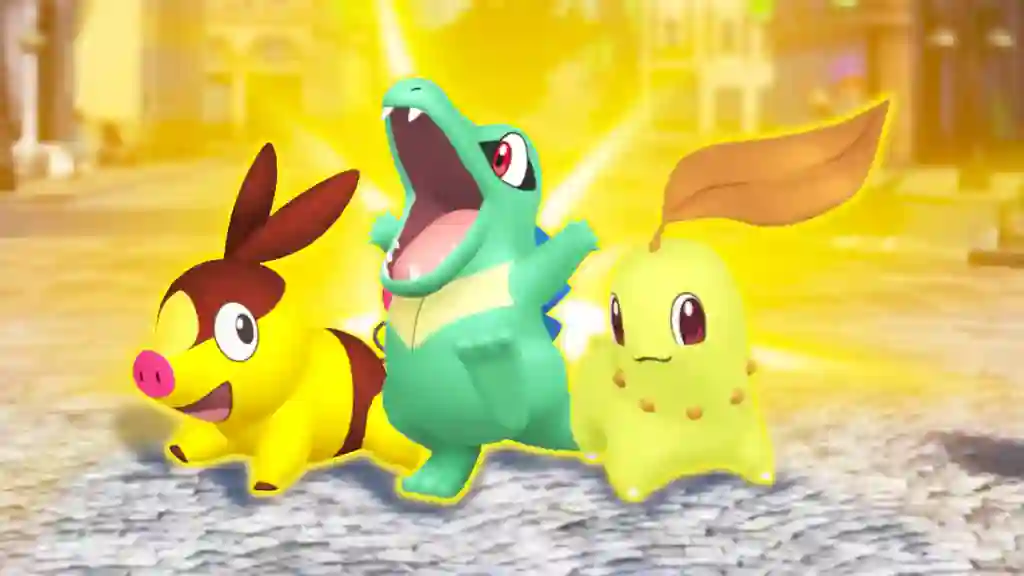 Tepig, Totodile y Chikorita en sus versiones shiny corren juntos por una plaza bañada en luz dorada en Leyendas Pokémon ZA. Tepig, Totodile y Chikorita en sus versiones shiny corren juntos por una plaza bañada en luz dorada en Leyendas Pokémon ZA.
