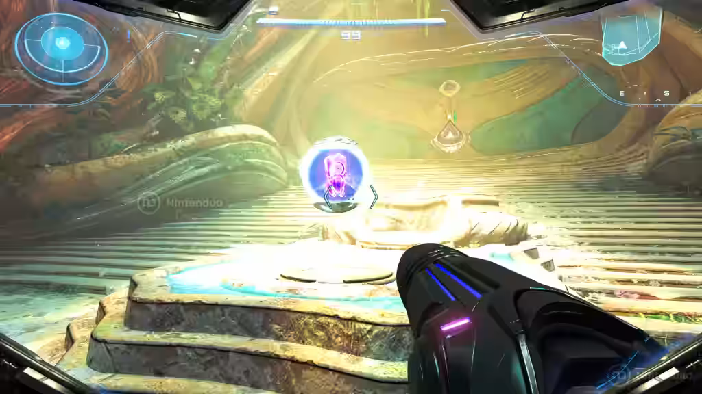 Vista en primera persona de Samus Aran apuntando hacia una esfera de energía rosa que flota sobre un pedestal en Metroid Prime 4 Beyond para Nintendo Switch 2