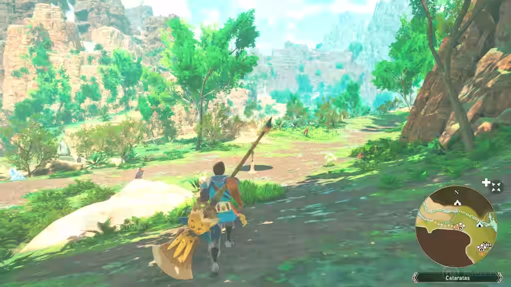 Ares avanza por un valle verde con su compañero monstruo en Monster Hunter Stories 3 mientras el minimapa guía el camino.