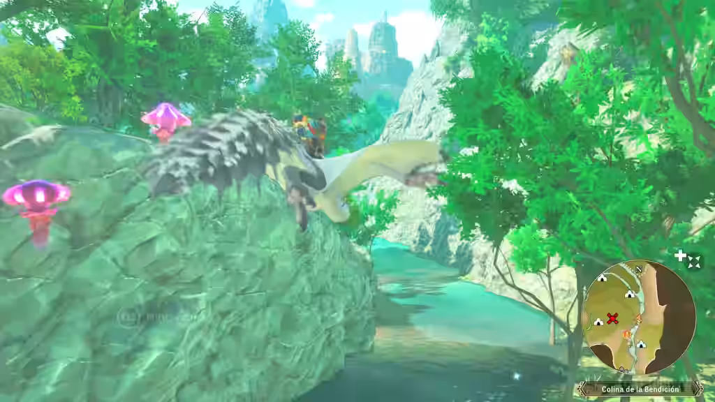 Dos monstruos voladores planean sobre un río en un cañón verde de Monster Hunter Stories 3.